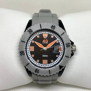 40Nine quartz analog men’s date watch 42mm two tone dial rotating bezel running
